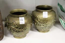 A pair of Chinese bronze vases.