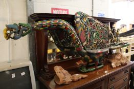 A Borneo carved wood and polychrome decorated hornbill.