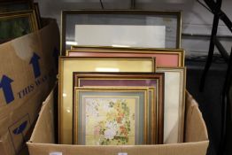 A quantity of paintings and prints.