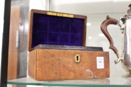 A leather jewellery box.