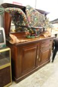 An Edwardian mahogany sideboard.
