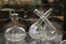 Two silver mounted oil bottles.