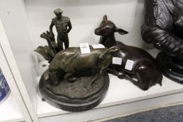 A good modern bronze casting of a bull fighter and bull together with a bronze seated deer.
