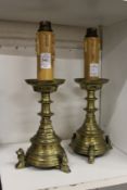 A pair of glass candlestick style lamps bases.