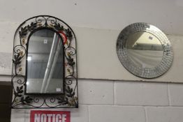 Two decorative mirrors.