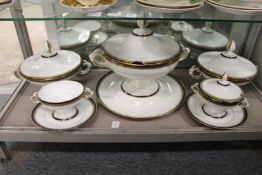 A large Rosenthal soup tureen, cover and stand with a pair of matching vegetable dishes and sauce