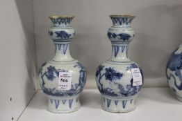 A pair of Chinese blue and white bottle vases.