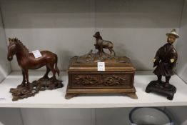 A Black Forest style carved wood casket and two other items.