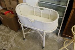 A Lloyd Loom style crib.