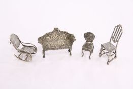 Miniature silver furniture to include a rocking chair.
