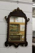 A Georgian style fretwork framed wall mirror.