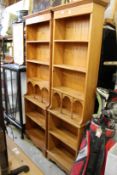 Two pine standing open bookcases.