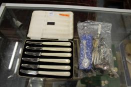 A cased set of fruit knives and a small group of flatware.