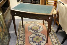 A mahogany two drawer writing table.