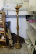 A giltwood standard lamp.