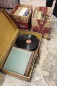 A quantity of gramophone records, LP's etc. including an old suitcase.
