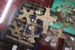 A quantity of early bronze crucifixes.