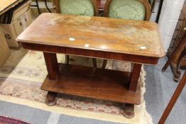 A 19th century mahogany rise and fall dumb waiter.