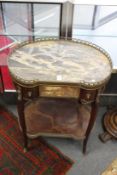 A French marble topped two tier occasional table.