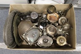 A box of plated wares.