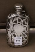 A silver overlaid hip flask.