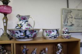 A Losol ware jug, bowl and wash set.