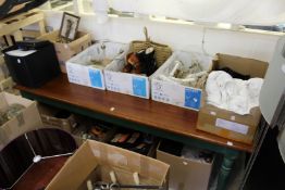 A large kitchen table with green painted legs.