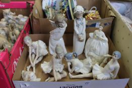 A Lladro figure and similar china.