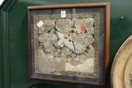 A Chinese embroidered rank badge, framed and glazed.