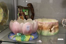 A Clarice Cliff Lily form planter, together with a Old Feeding Time Burleigh ware jug and a