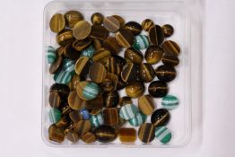 Loose tiger's eye and other stones.