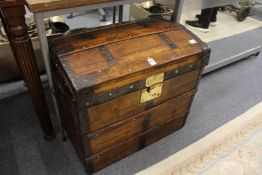 A good small dome top trunk with brass metal fittings.