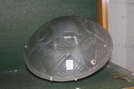 A moulded frosted glass ceiling shade.