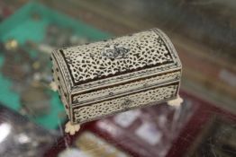 A small Indian bone and sandalwood casket.