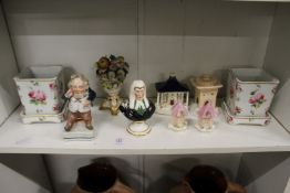 A shelf of decorative 19th century china.