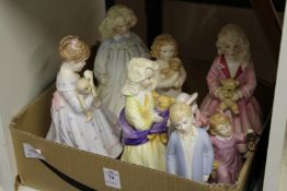 A group of porcelain figurines by Royal Worcester etc.
