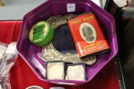 An Art Nouveau silver photograph frame and other collectables.