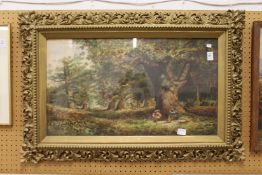 Wooded Landscape with Figures Seated Beneath a Tree watercolour, in a decorative gilt frame.