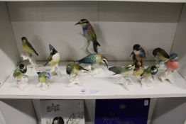 A group of Goebel bird ornaments.