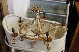 A wrought iron chandelier.