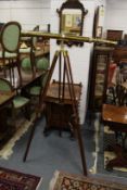 A good reproduction brass telescope on tripod stand.