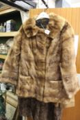 A ladies' fur jacket.