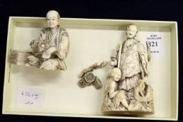 Two early 20th century Japanese carved ivory okimonos.