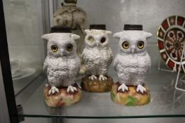 Three moulded owl lamp bases (one lacking eyes).