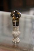 A silver desk seal with hardstone handle.