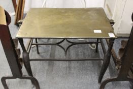 A 19th century brass and steel footman.