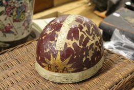 An old skid lid (crash helmet).