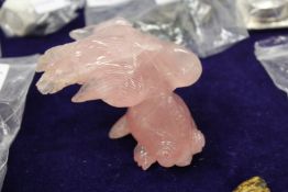 A Chinese rose quartz model of a fish.