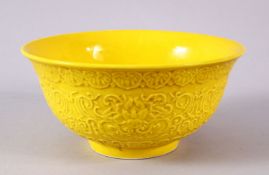 A CHINESE YELLOW GLAZED MOULDED LOTUS PORCELAIN BOWL - the body with moulded lotus decoration and
