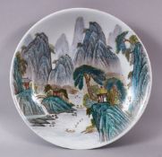 A MID-20TH CENTURY CHINESE LANDSCAPE DISH, depicting a vast mountainous setting with buildings,
